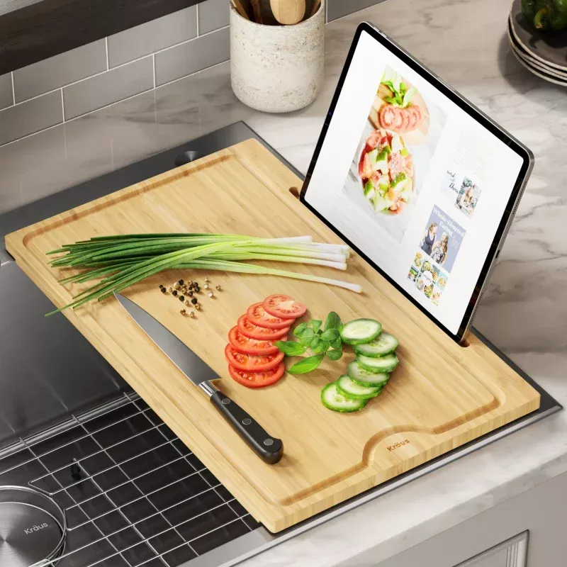 KRAUS Solid Bamboo Cutting Board with Mobile Device Holder for most Standard Kitchen Sinks