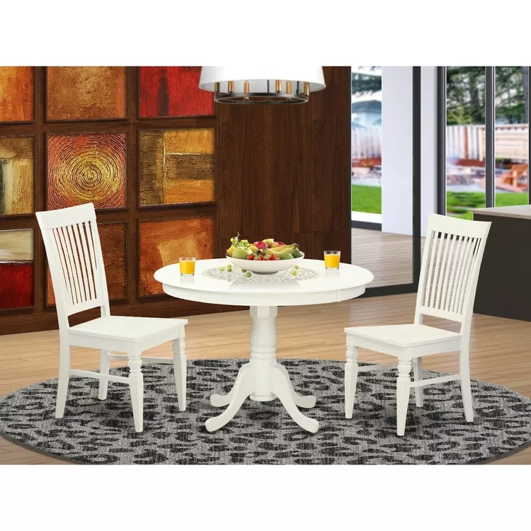 Set With A Round Dinette Table And Kitchen Chairs